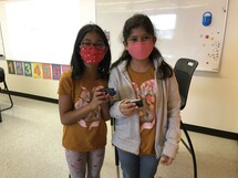 Two students posing during a circuit unit.